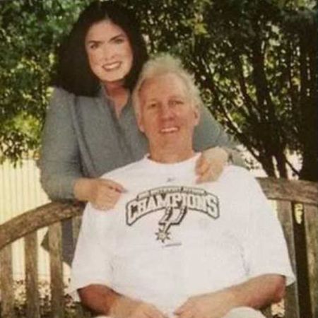 Micky Popovich's parents Gregg Popovich and the late Erin Popovich in a single frame.